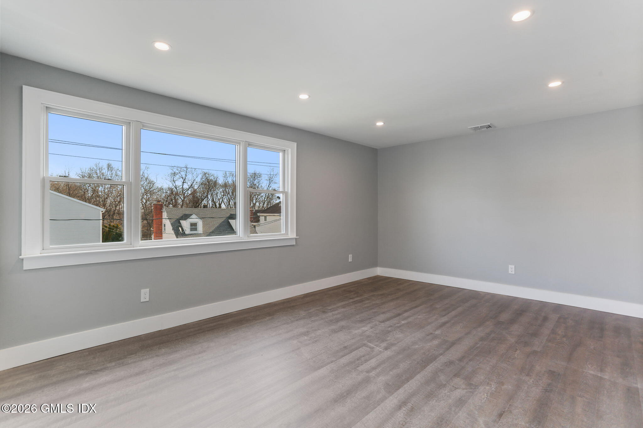 35 Euclid Avenue, Unit B Stamford, CT 06902 - Photo 6 of 27 a view of an empty room with a window