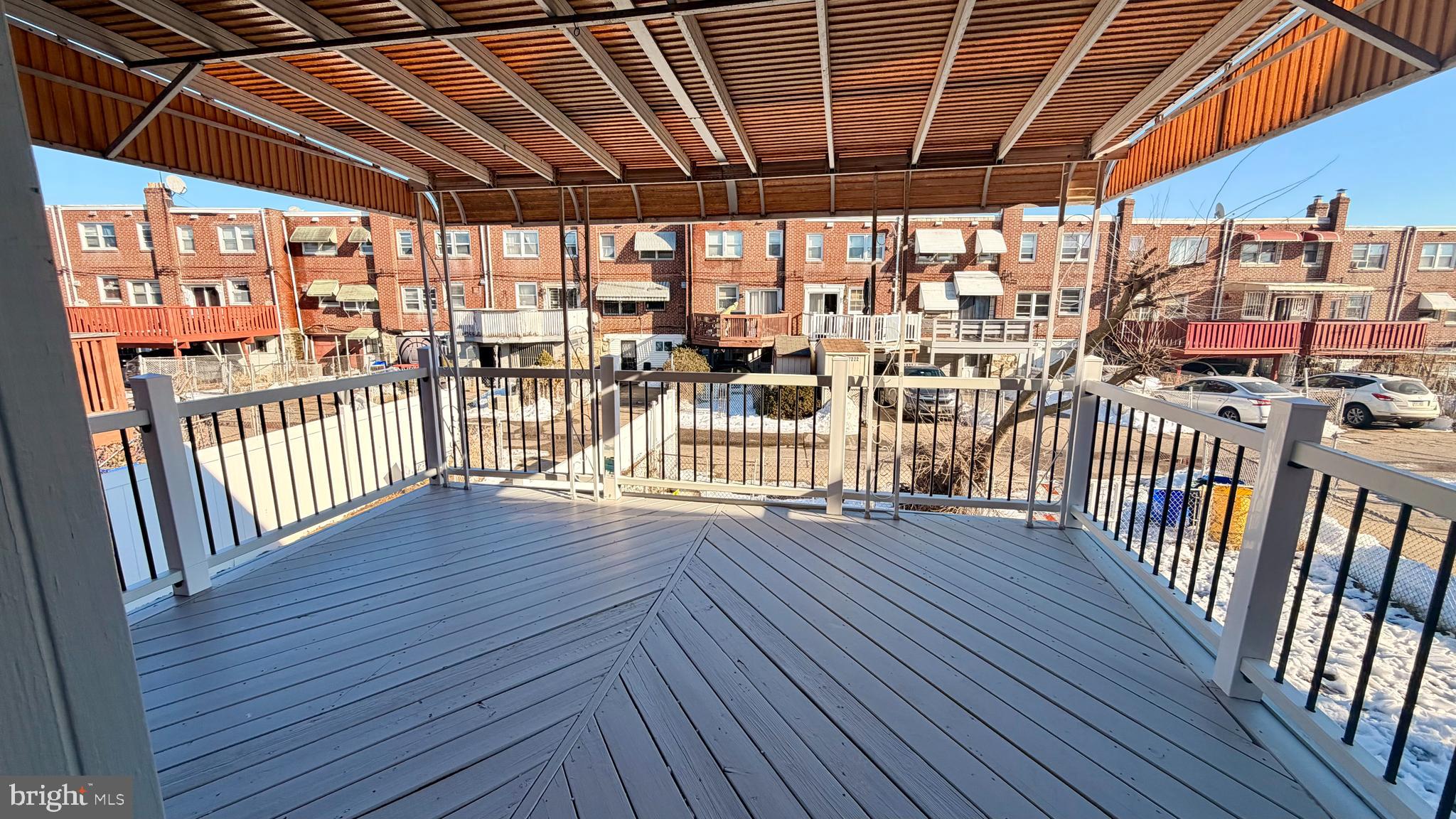 7219 Saul Street Philadelphia, PA 19149 - Photo 9 of 24 a view of a balcony with wooden floor