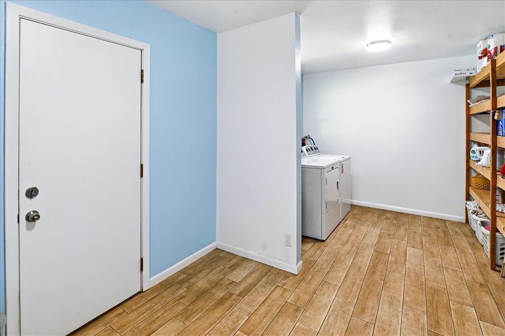 12657 Alma Street Tyler, TX 75704 - Photo 14 of 36 a view of empty room with wooden floor