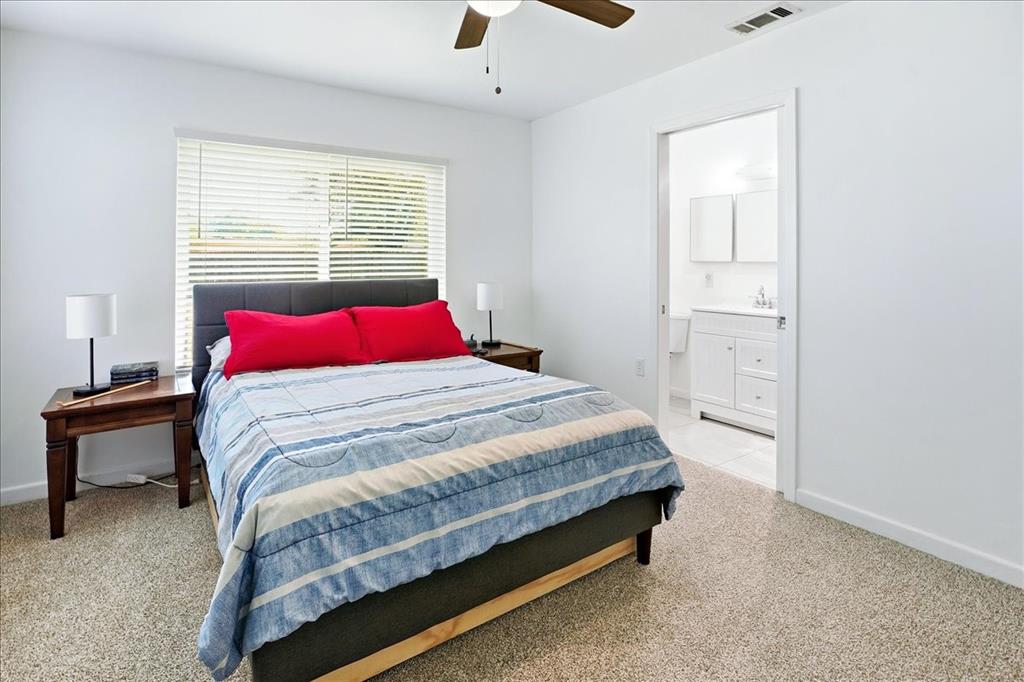 12657 Alma Street Tyler, TX 75704 - Photo 24 of 36 a bedroom with a bed and a window