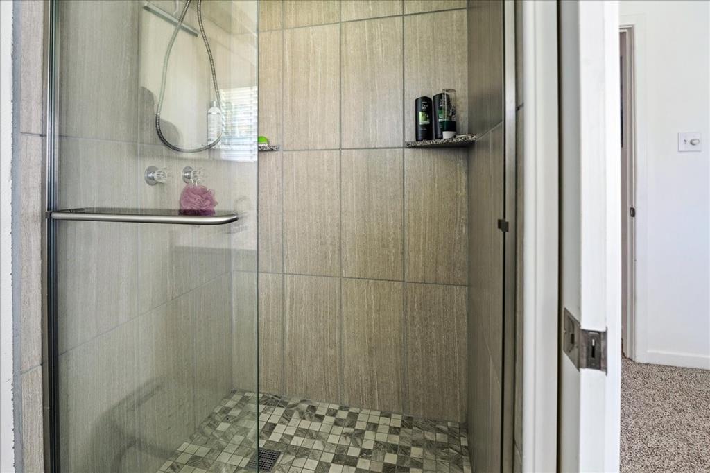 12657 Alma Street Tyler, TX 75704 - Photo 27 of 36 a bathroom with a shower
