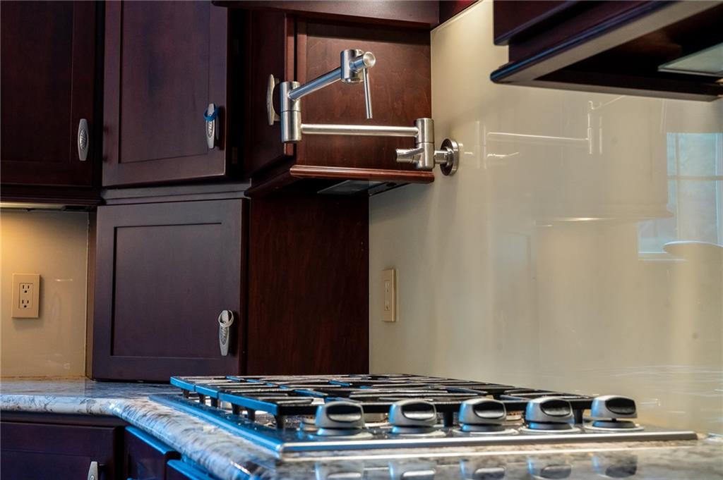 2450 Lytle Road Bethel Park, PA 15102 - Photo 16 of 50 Close-up gas stove and pot filler