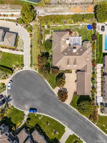 an aerial view of a house with a ocean view
