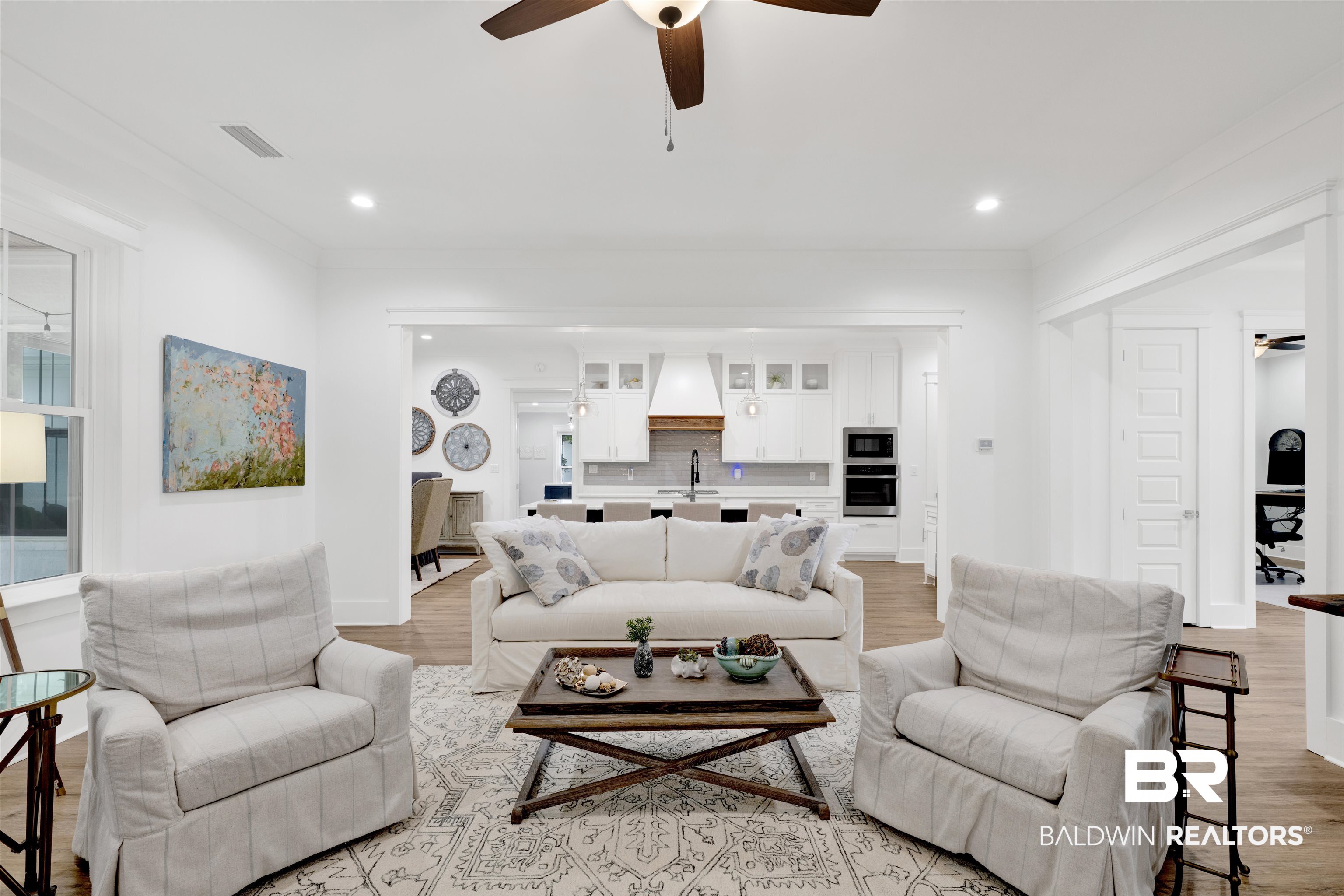 21702 Pillars Street Fairhope, AL 36532 - Photo 11 of 54 Expansive living area featuring light wood-finish flooring and recessed lighting