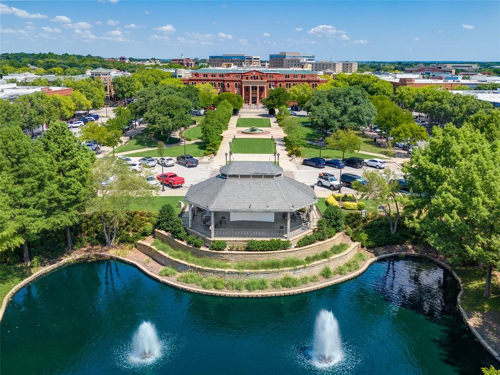 1530 Meeting Street, Unit 1304 Southlake, TX 76092 - Photo 16 of 40 a view of a swimming pool with a yard and plants