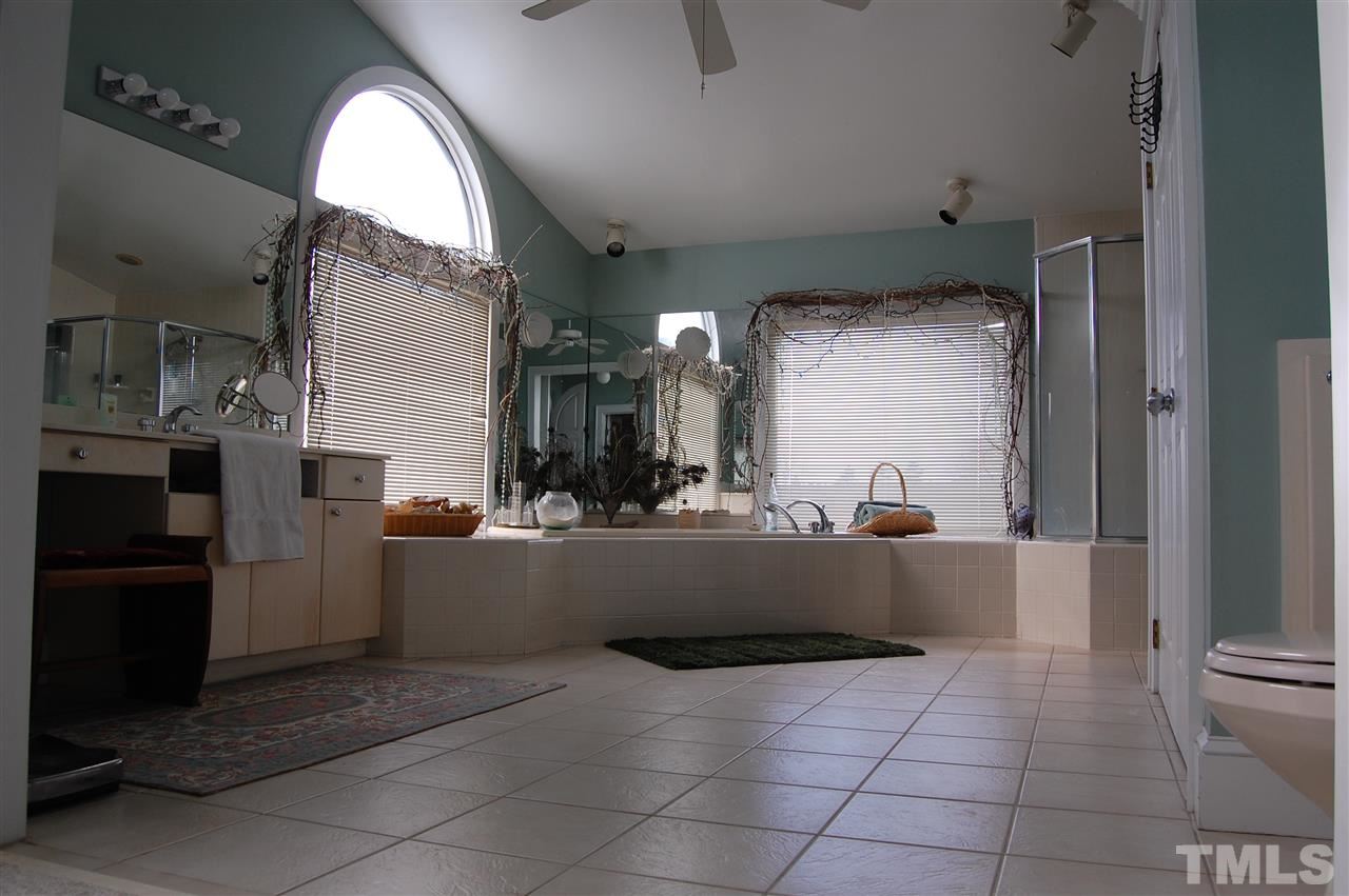 6740 Good Life Road Wendell, NC 27591 - Photo 14 of 25 a room with cabinets and fireplace