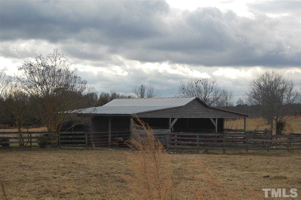 6740 Good Life Road Wendell, NC 27591 - Photo 21 of 25 a front view of a house with a yard