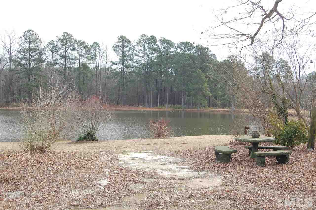 6740 Good Life Road Wendell, NC 27591 - Photo 4 of 25 a view of a lake