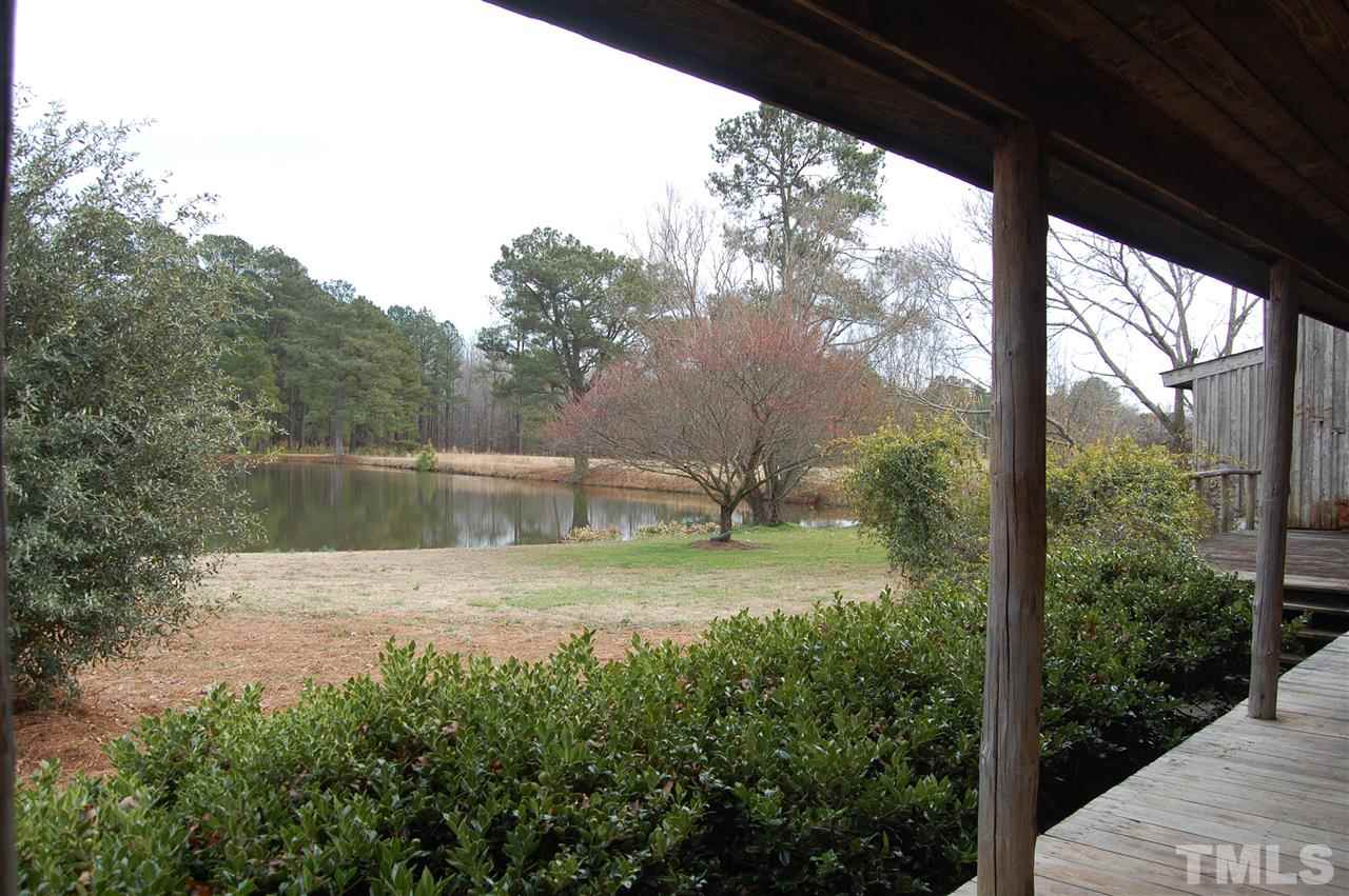 6740 Good Life Road Wendell, NC 27591 - Photo 5 of 25 a view of a backyard with large trees