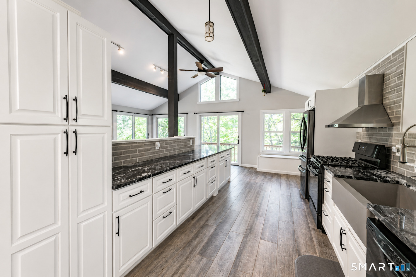 98 Fairy Dell Road Clinton, CT 06413 - Photo 8 of 25 With extensive cabinetry, generous prep space, and views that bring the outdoors in, this beautifully remodeled kitchen is as functional as it is inviting.