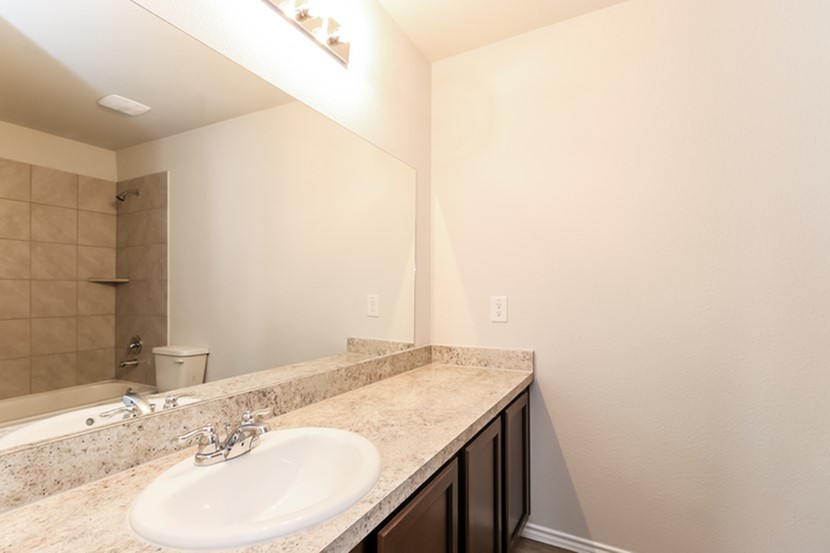 2743 Madison Court Conroe, TX 77304 - Photo 14 of 15 Photos may be representative of the floor plan and not the exact home. Finishes, layout, and features of the actual property for lease may vary.