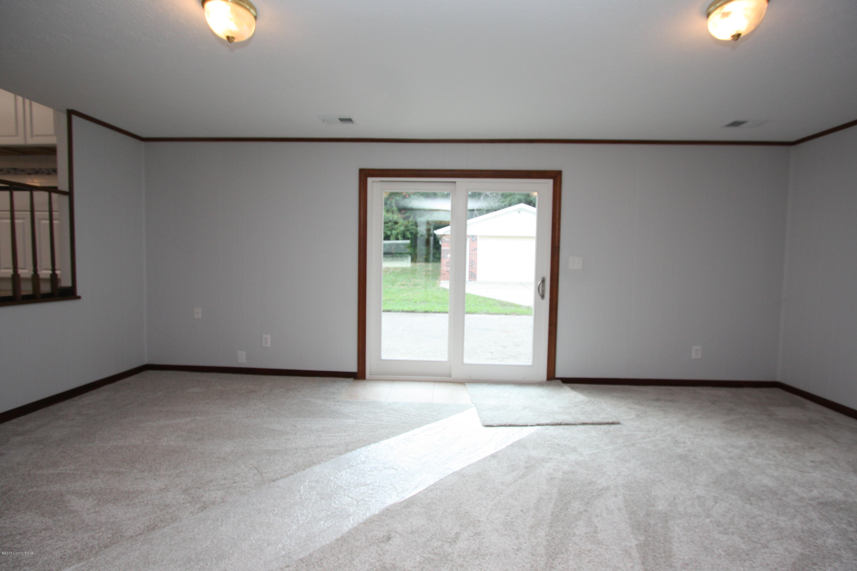 3712 Longview Road Jeffersontown, KY 40299 - Photo 24 of 35 New patio door in lower level family room