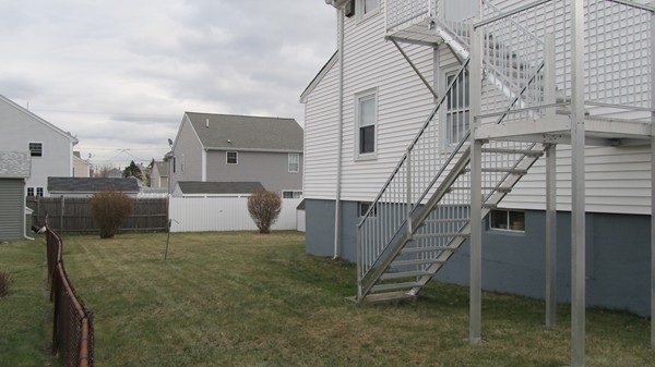 14 Boyden Street Fall River, MA 02721 - Photo 4 of 6 a utility room with a washer and dryer