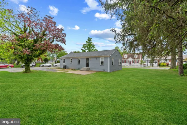 a view of a house with a big yard