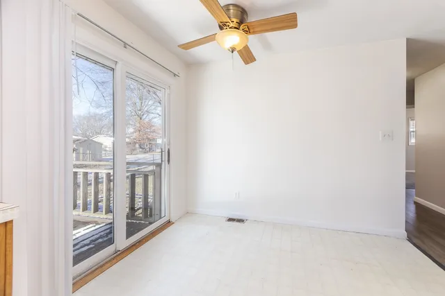a kitchen with stainless steel appliances a refrigerator and a stove top oven