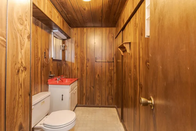 a view of a brick house with many windows