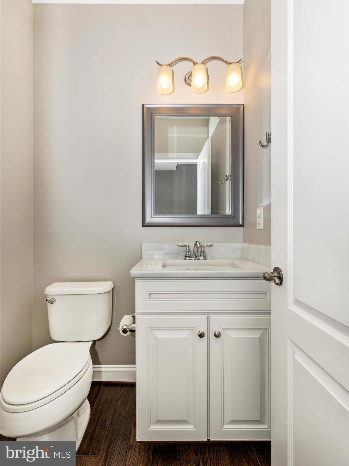 2 Maxwell Square Frederick, MD 21701 - Photo 21 of 59 a bathroom with a toilet a sink and mirror
