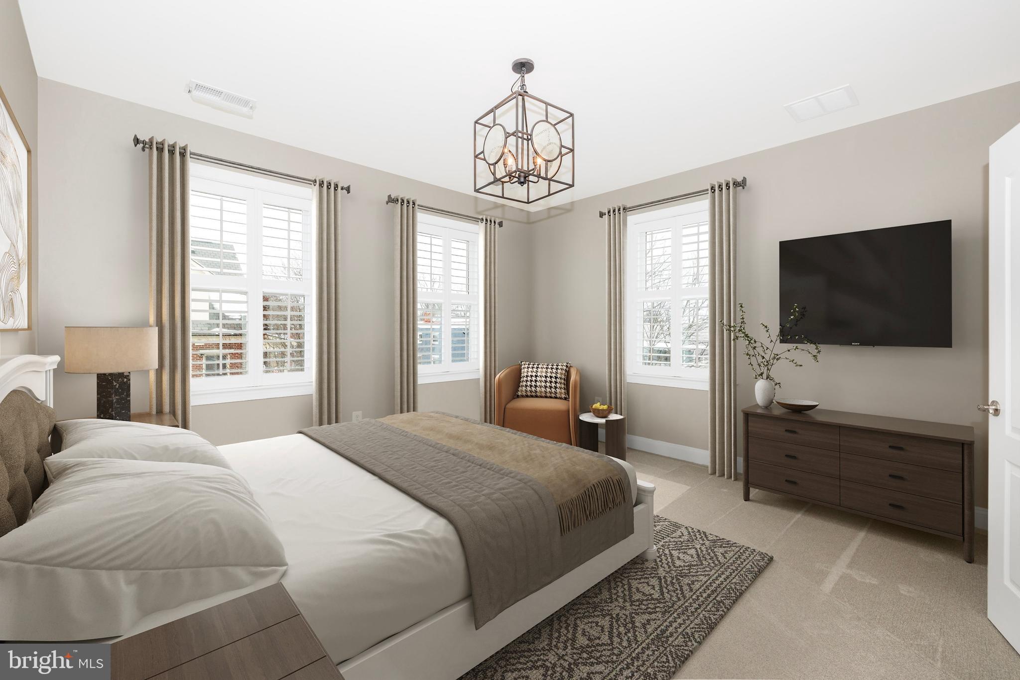 2 Maxwell Square Frederick, MD 21701 - Photo 23 of 59 a bedroom with a bed and a flat screen tv