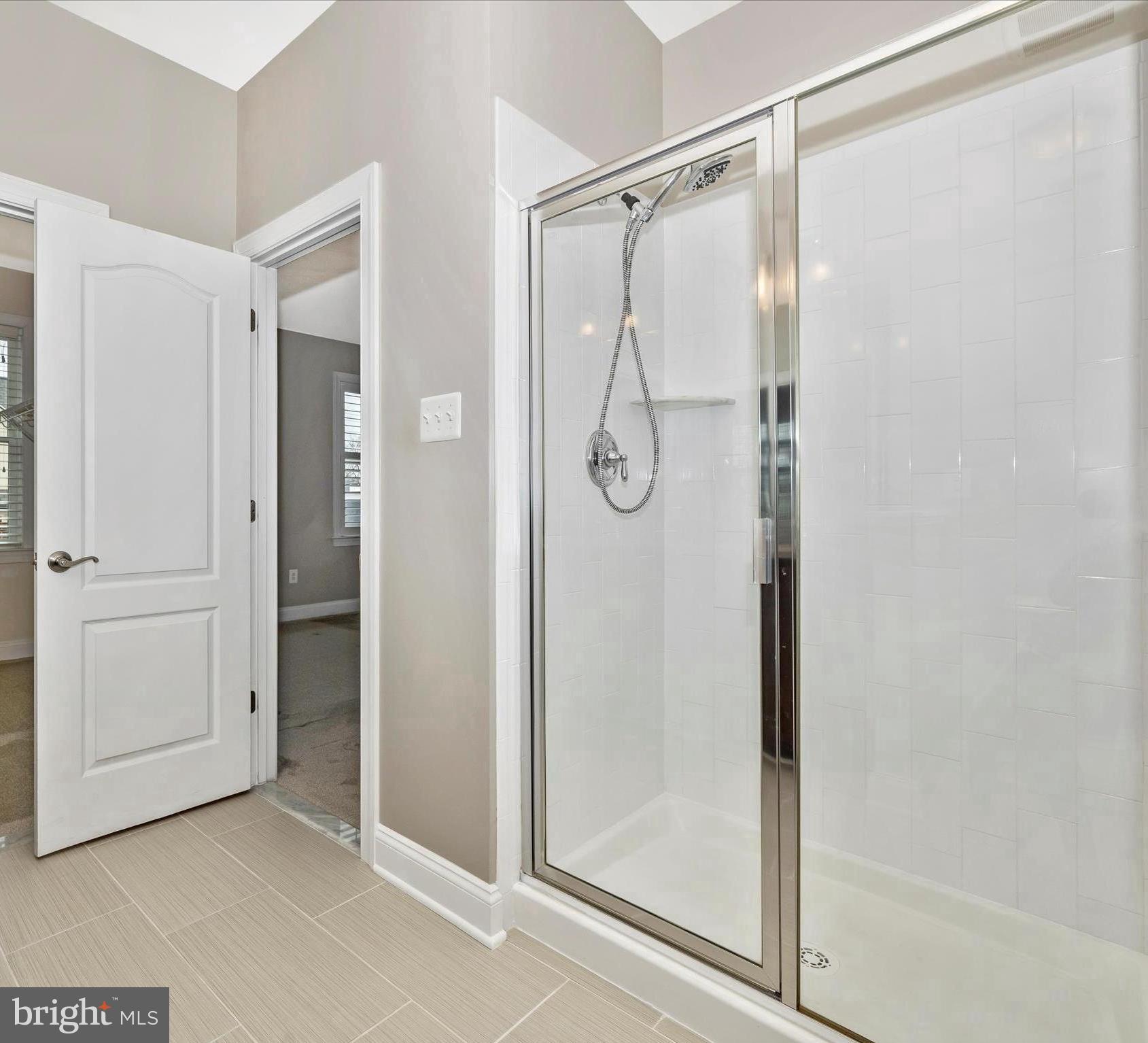 2 Maxwell Square Frederick, MD 21701 - Photo 27 of 59 a bathroom that has a glass shower door