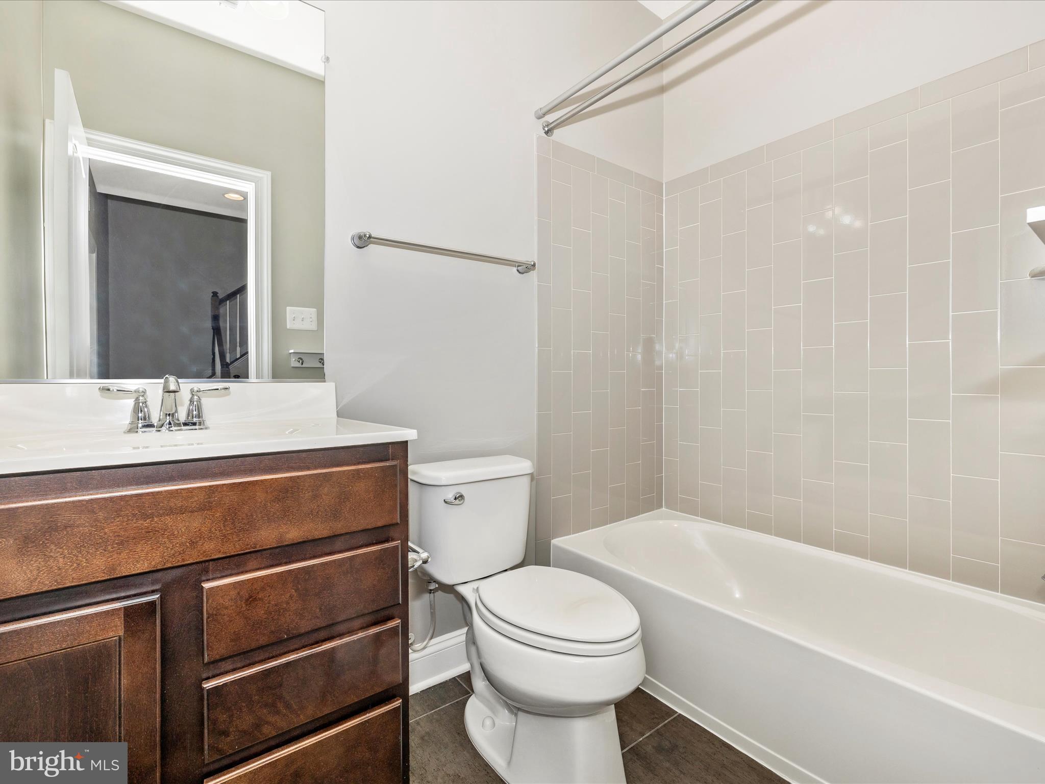 2 Maxwell Square Frederick, MD 21701 - Photo 32 of 59 a bathroom with a sink a toilet and a bathtub