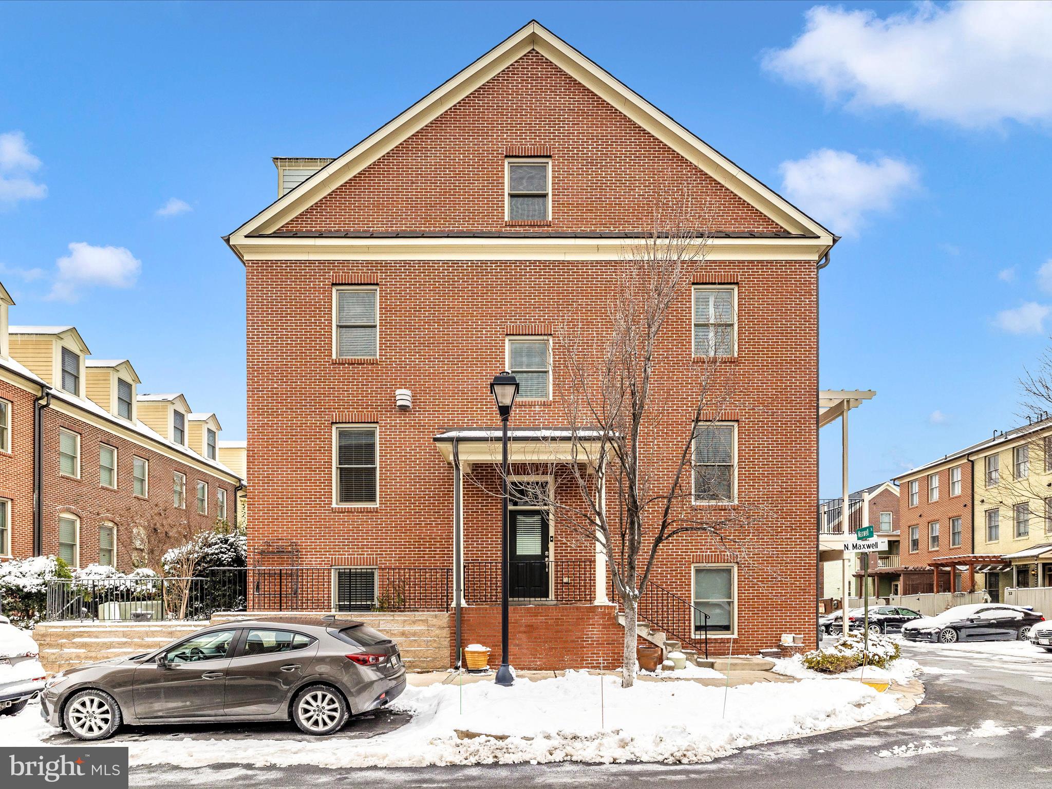 2 Maxwell Square Frederick, MD 21701 - Photo 4 of 59 a front view of a house with a yard
