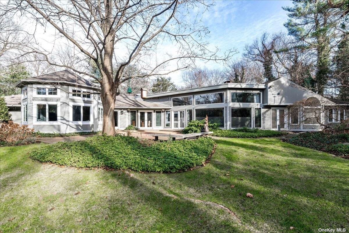 12 Soundview Lane Sands Point, NY 11050 - Photo 1 of 1 a view of a house with a yard and sitting area