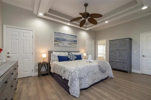 a view of a balcony with furniture and floor to ceiling window
