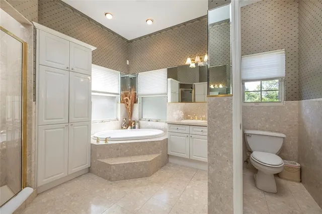 a bedroom with a bed and a closet