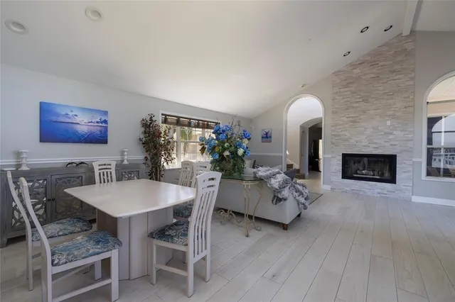 a front view of a house with outdoor seating