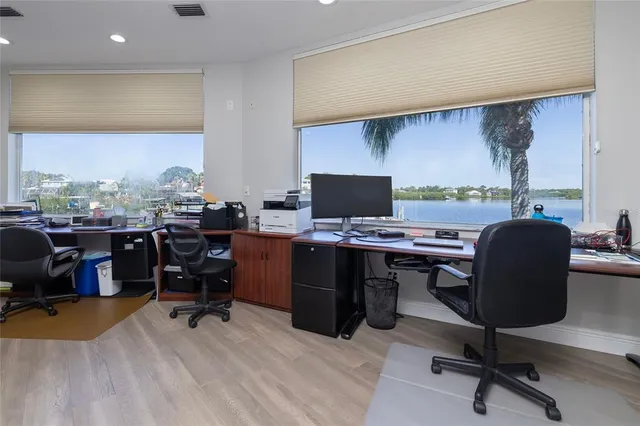 a view of a roof deck with sitting area