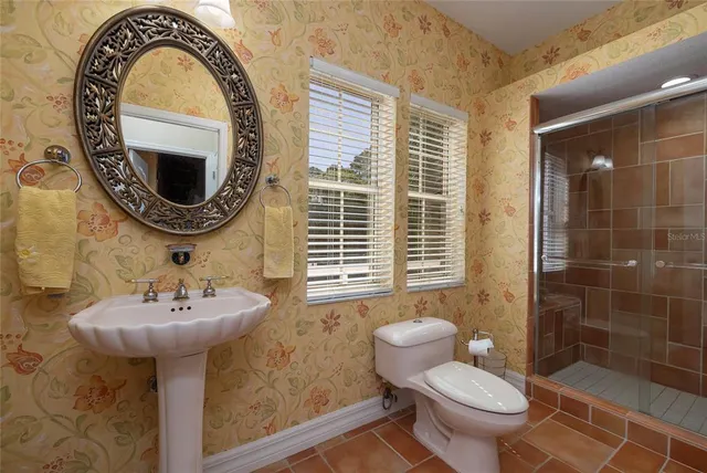 a view of roof deck with couches