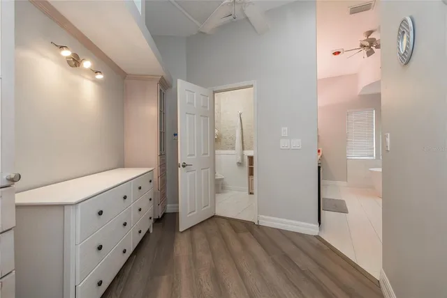 a view of a balcony with two chairs