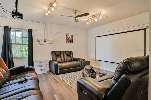 an aerial view of a houses with a lake view