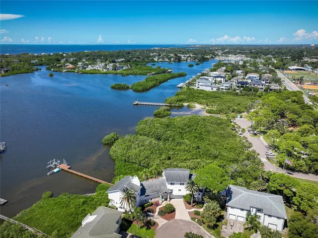 a view of entryway and hall with a floor to ceiling window