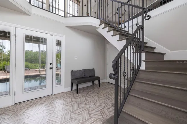 a kitchen with a table and chairs in it