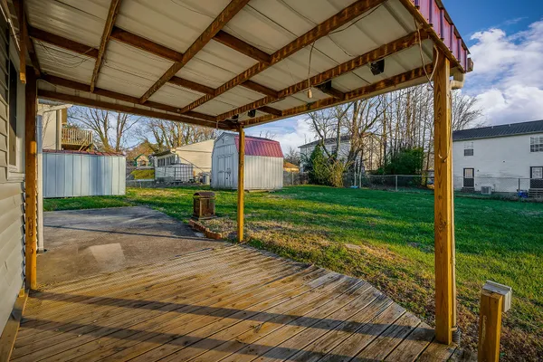 a view of a porch with a backyard