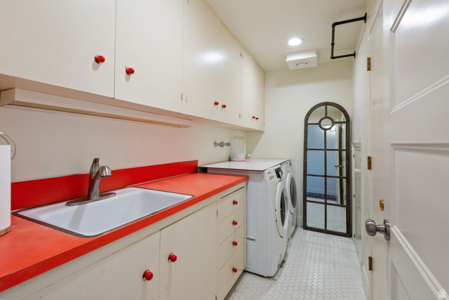 1900 North 100 East Provo, UT 84604 - Photo 36 of 49 Functional utility room featuring white cabinetry, a red countertop with integrated sink, white hexagon tile flooring, and dedicated appliance space