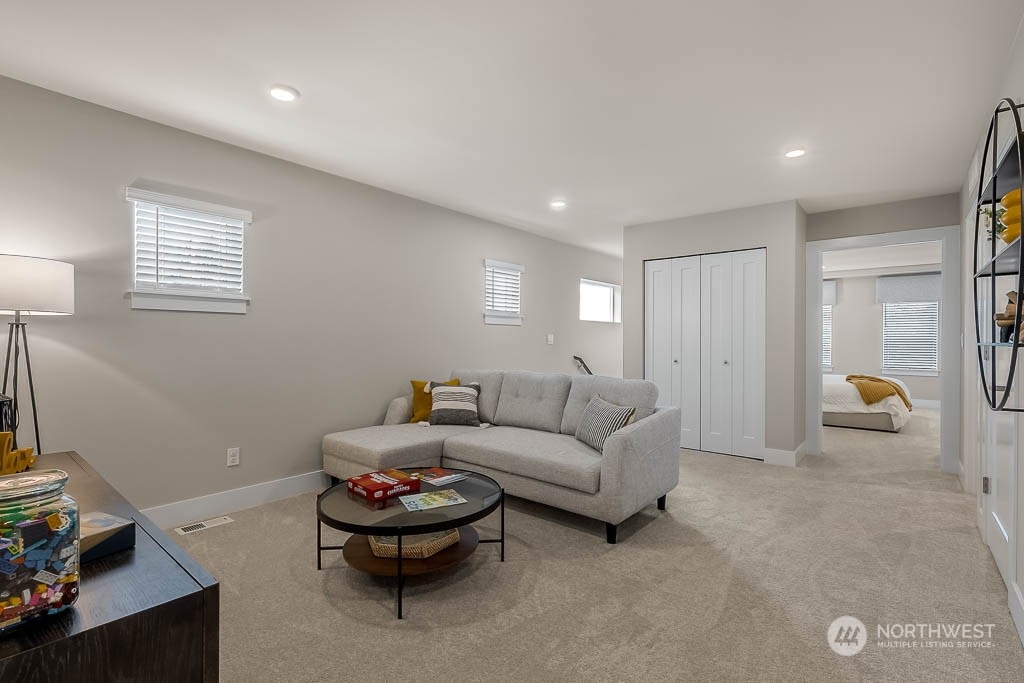 22905 20th Place West Bothell, WA 98021 - Photo 19 of 26 a living room with furniture and a window