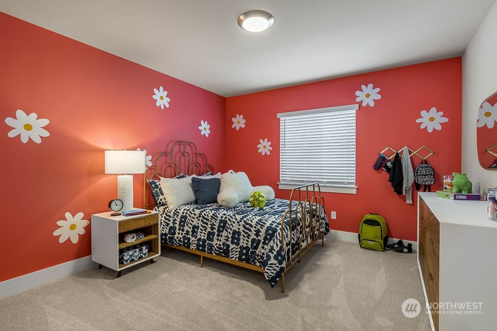 22905 20th Place West Bothell, WA 98021 - Photo 23 of 26 a bedroom with a bed and a lamp with window