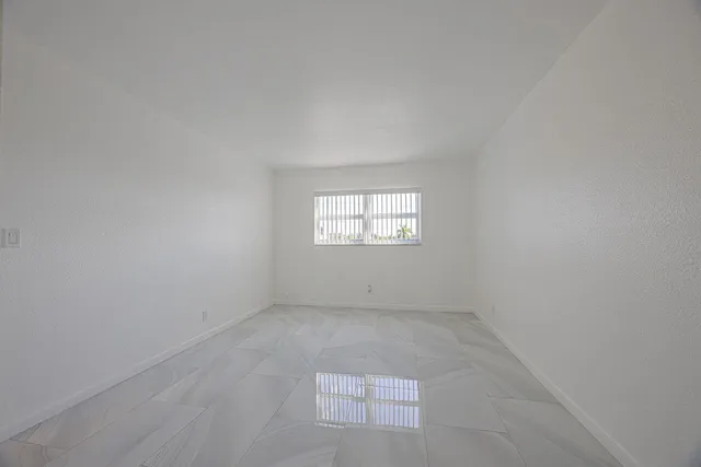 an empty room with a window