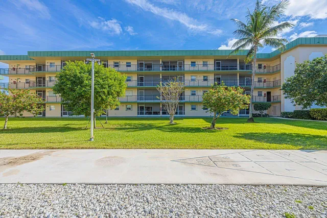 a view of a house with a swimming pool