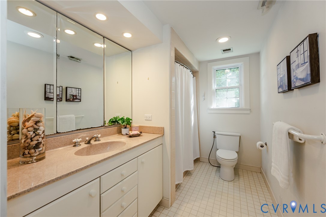 8470 McClellan Road Mechanicsville, VA 23111 - Photo 18 of 33 Full bath between bedrooms 2&3