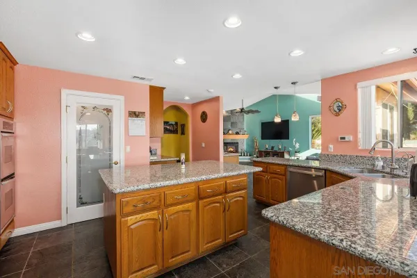 a large kitchen with cabinets