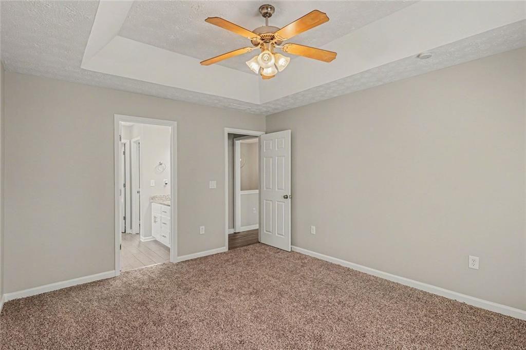 10 Wilbur Way Covington, GA 30016 - Photo 7 of 22 wooden floor in an empty room