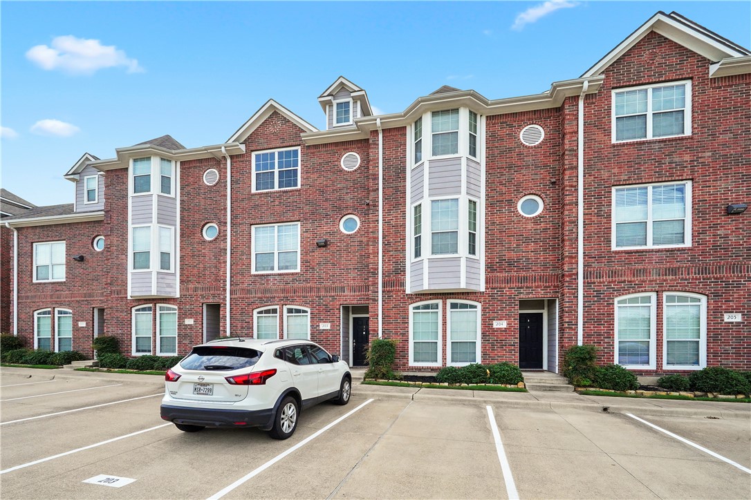 1198 Jones-Butler Road College Station, TX 77840 - Photo 7 of 21 View of property featuring uncovered parking