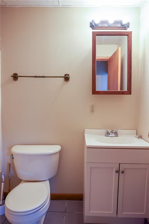 221 2nd Street, Unit 5 Smithton, PA 15479 - Photo 10 of 13 a bathroom with a toilet sink and mirror