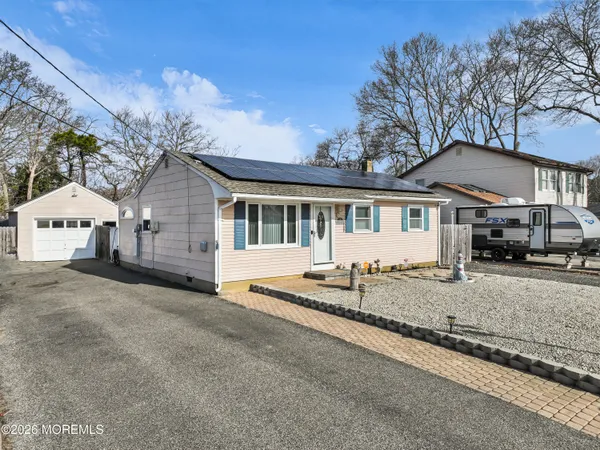 a view of a yard in front of a house