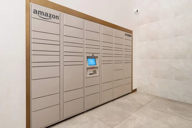 a view of a livingroom with furniture and a large window