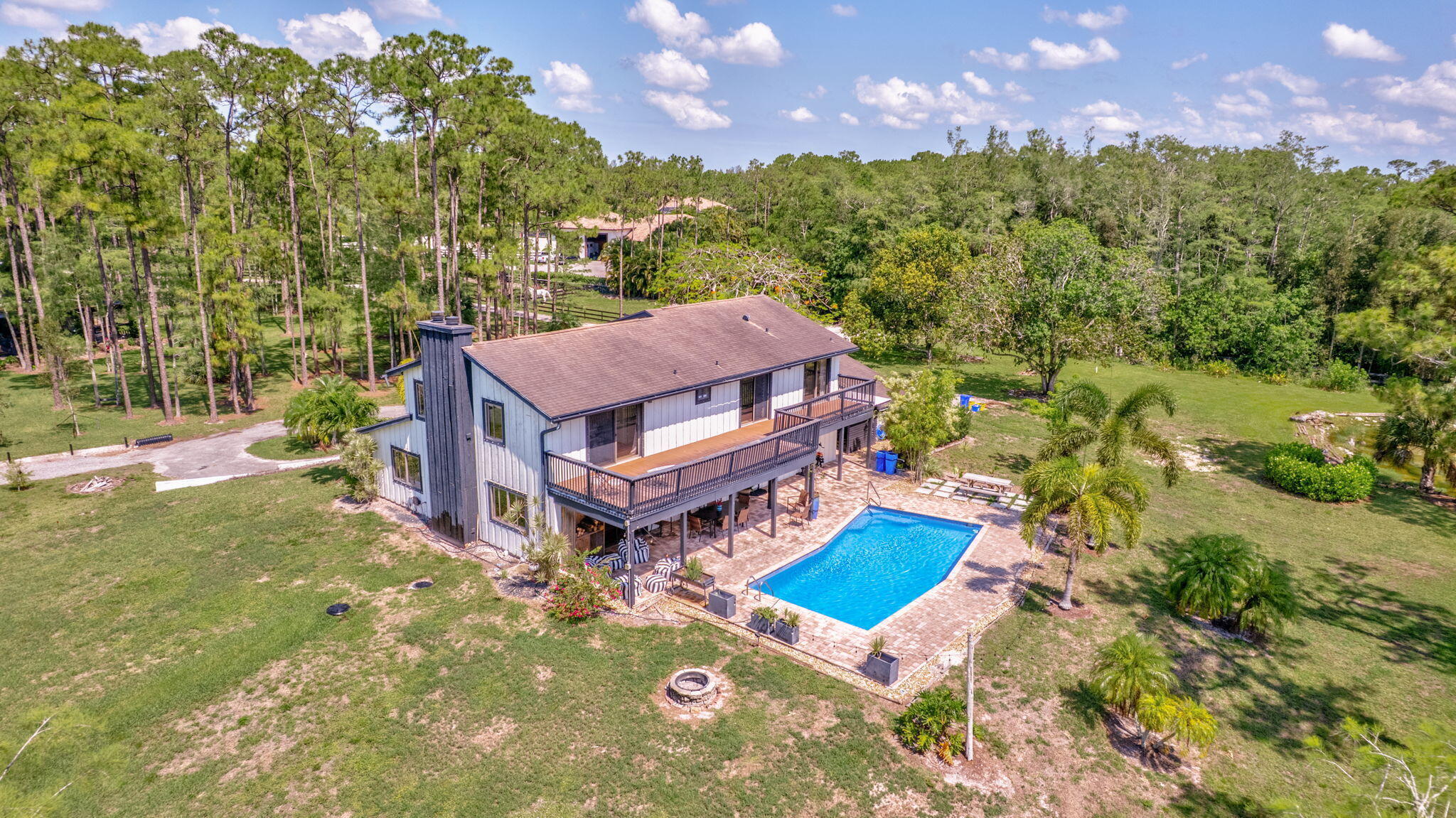 5446 Reynolds Road Lake Worth, FL 33449 - Photo 49 of 57 an aerial view of a house with a big yard