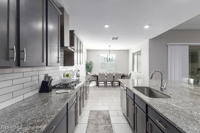 a view of a dining room with furniture and window